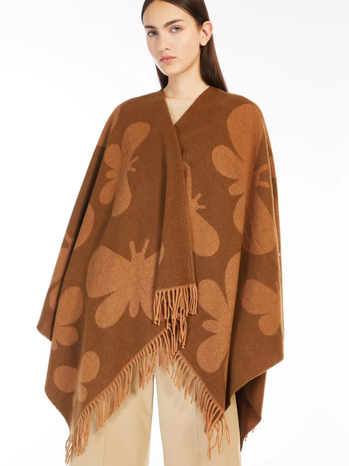 poncho_in_lana_jacquard_3.webp Discount Poncho in lana jacquard Sciarpeefoulard